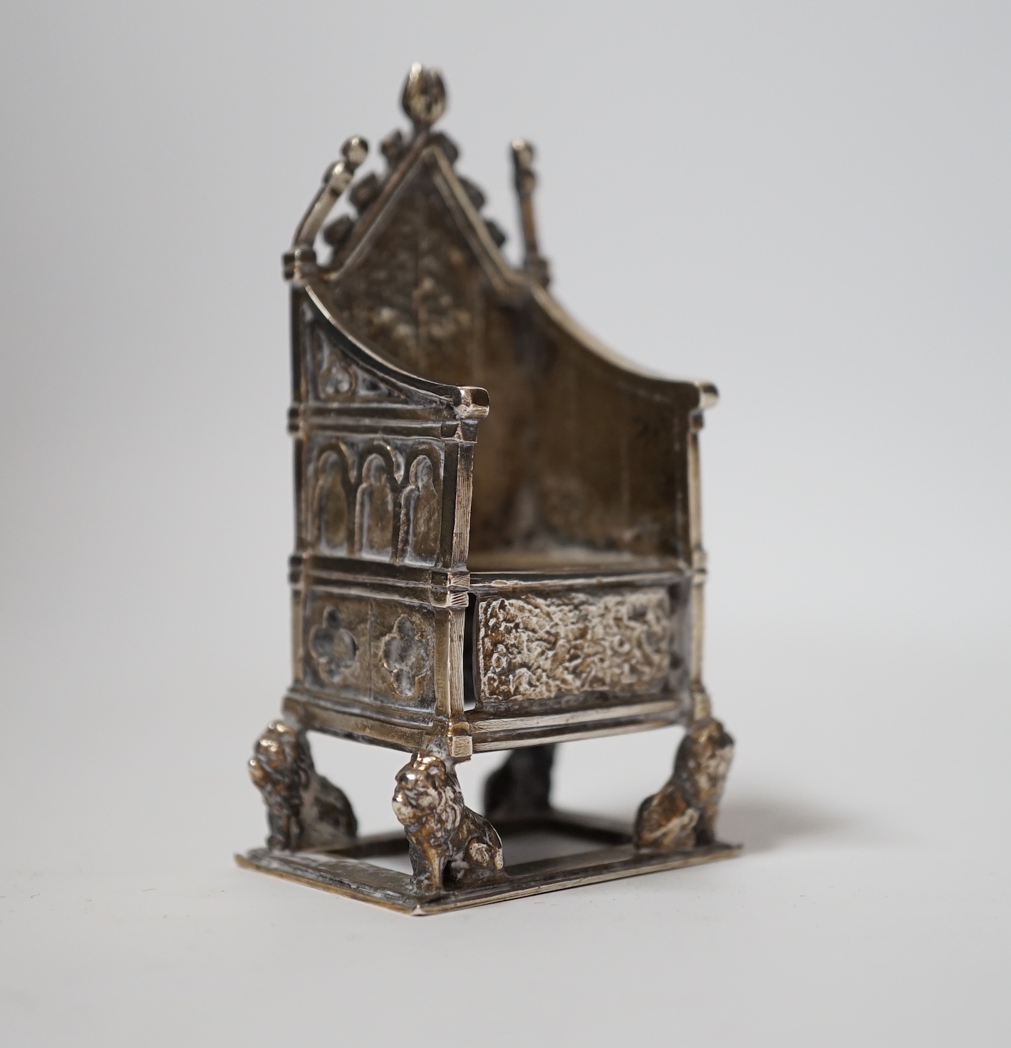 A George V silver miniature model of a throne, by Saunders, Shepherd & Co Ltd, London, 1936, 85mm, 92 grams.